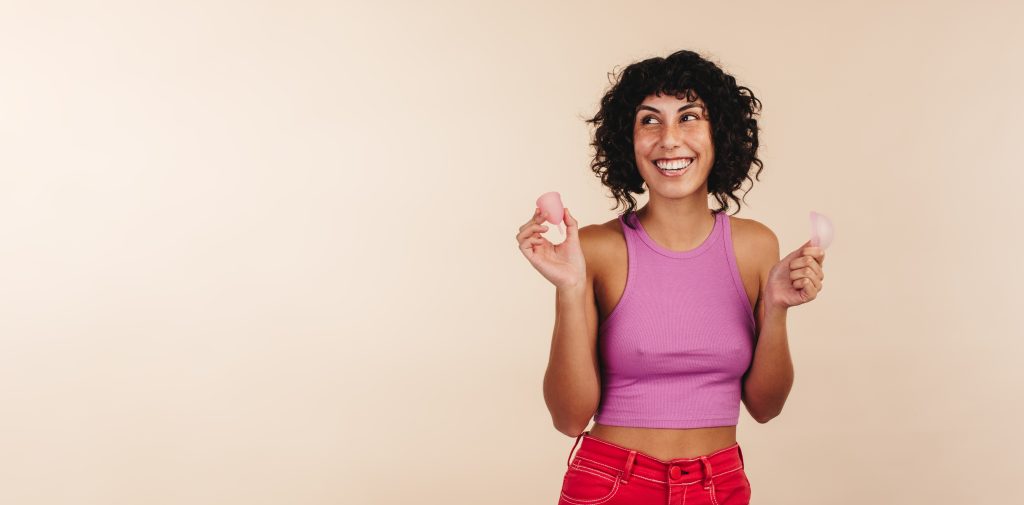 Two people discussing a reusable menstrual cup